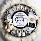 Baby announcement new years with teddy bear, shoes, onesie, and ultrasound photo on a fluffy white background.
